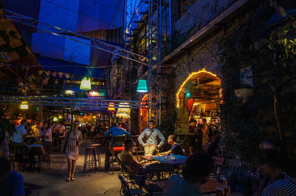 Exposed brick and fairylights make up the decor at Szimpla.